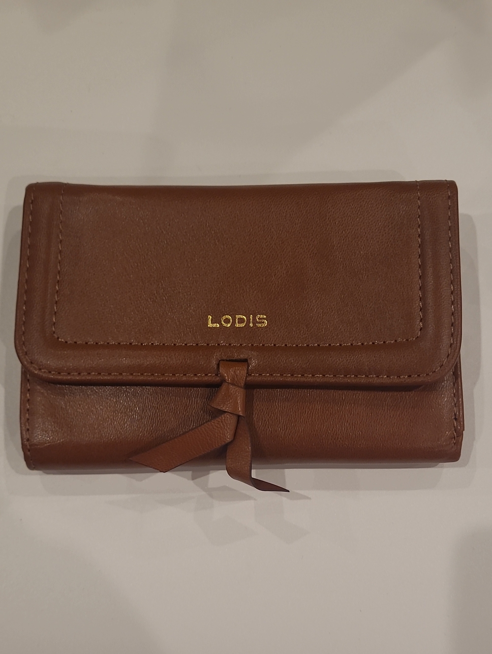 Lodis Chestnut Brown Leather Fold-Over Wallet with Knot Accent